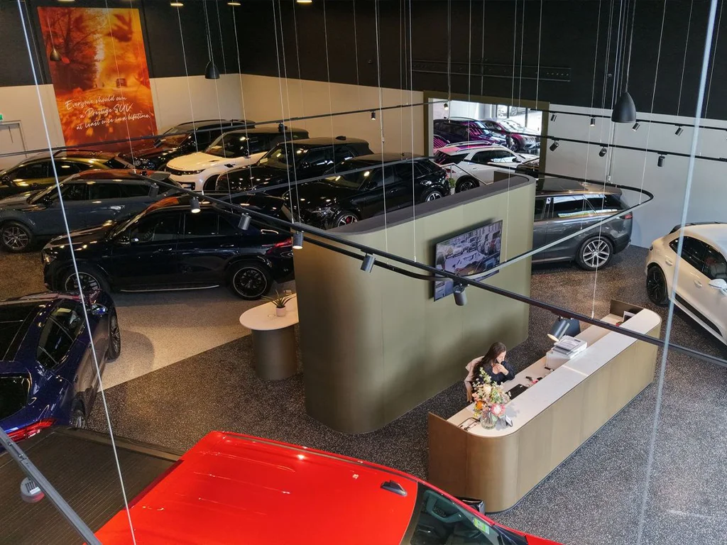 The main showroom floor at 185 Arden Street, prestige stock indoors